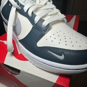 Nike Dunk Low in White and Navy